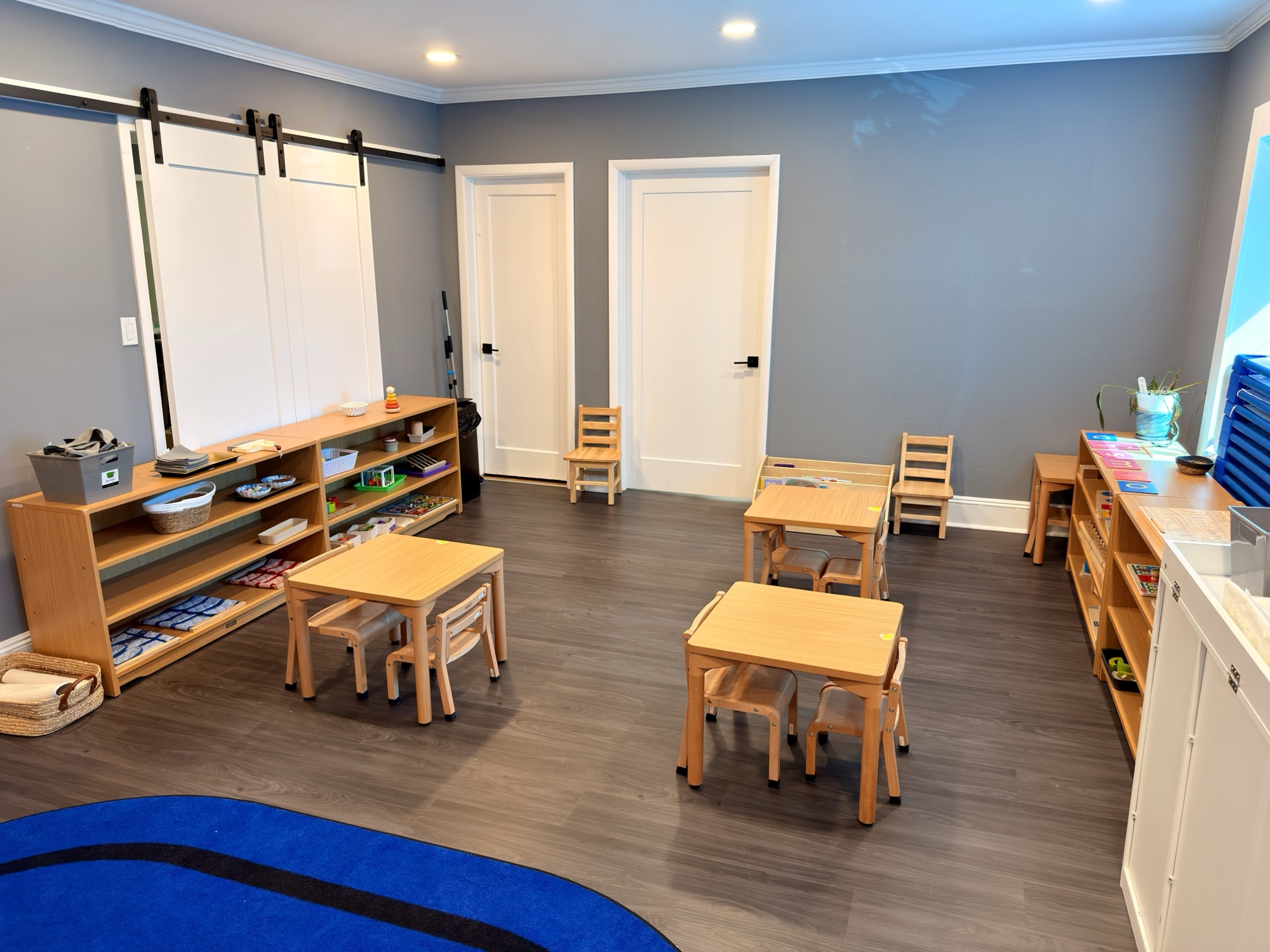 Child-sized tables and Montessori work areas